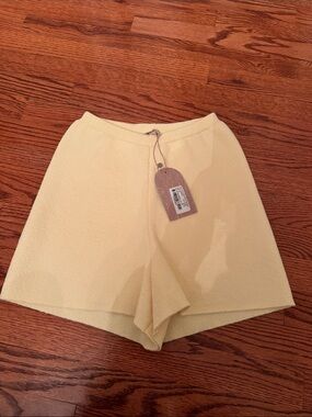 Towel material butter yellow meshki shorts size XS NWT